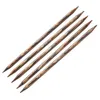 A set of knitting needles arranged diagonally on a white background. Produktbild-Vorschau