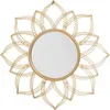 A gold-colored mirror with a decorative, petal-like frame. Náhled obrázku produktu
