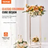 A product image showcasing gold columnar cube design flower stands with floral arrangements. Produktbild-Vorschau