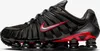 A side view of a black Nike Shox TL sneaker with red accents. Produktbild-Vorschau