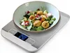 A digital kitchen scale with a bowl of salad on top. Náhled obrázku produktu