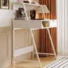 A white computer desk with shelves and drawers, shown in a room with curtains and a rug. Produktbild-Vorschau
