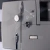 A close-up view of the side panel of a sewing machine, showing various controls and instructional diagrams. Náhled obrázku produktu