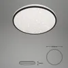 A round LED ceiling light with a star-like pattern on a plain gray background, accompanied by technical drawings showing dimensions. Náhled obrázku produktu