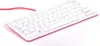 A white Raspberry Pi keyboard with a red trim and a red cable, shown from a diagonal angle on a white background. Produktbild-Vorschau