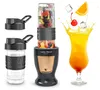 A smoothie blender with fruit and ice, alongside a finished smoothie in a glass, and extra blender cups and lids. Podgląd zdjęcia produktu