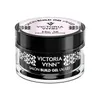 A studio shot of a Victoria Vynn Build Gel UV/LED nail product in a black and clear jar with pink labeling. Náhled obrázku produktu