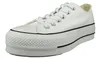 A white Converse Chuck Taylor All Star Lift Ox platform sneaker is shown from a side angle against a white background. Voir les images du produit