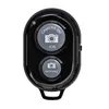 A black Bluetooth remote control for a camera. Produktbild-Vorschau