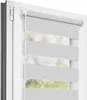 A close-up view of a light gray roller blind with horizontal stripes, installed in a white window frame. Produktbild-Vorschau