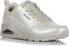 A single beige Skechers sneaker is shown from a side-angle on a white background. Voir les images du produit