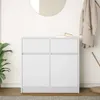 A white sideboard with two drawers on top and two cabinet doors below, placed in a room with a plant on the left and a coat rack with a coat on the right. Produktbild-Vorschau