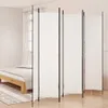 A white room divider is set up in a bedroom next to a bed. Náhled obrázku produktu