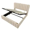 A beige upholstered bed frame with its mattress support system partially raised, revealing storage space underneath. Produktbild-Vorschau
