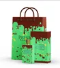A shopping bag and two boxes of Anfar Pistachio Kunafa Extrait de Parfum are displayed against a white background. Náhled obrázku produktu