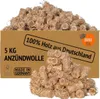 A cardboard box filled with fire starters, with a pile of fire starters in front of it. Produktbild-Vorschau