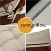 A collage of four close-up images of a cushion for a garden lounger, including a logo. Produktbild-Vorschau