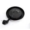 The bottom of a black electric kettle with a power cord and plug is shown against a white background. Produktbild-Vorschau