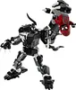 A black and white Lego mech figure with a red Lego figure held in its hand, set against a white background. Produktbild-Vorschau