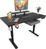 A black electric standing desk with a laptop, monitor, keyboard, and a drawer. There is also a cup holder with a cup and headphones attached to the side. Náhľad obrázku produktu