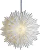 A white paper star lantern hanging from a ribbon. Podgląd zdjęcia produktu