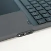 Close-up of a black keyboard case with a USB-C port and an on/off switch. Produktbild-Vorschau