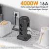 A black power strip tower with multiple outlets and USB ports is shown on a speckled countertop, next to a toaster with toast and a white kettle. Produktbild-Vorschau