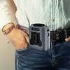A person wearing a light blue shirt and jeans is shown from the waist down, with a portable waist fan clipped to their belt. Produktbild-Vorschau