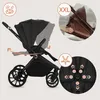 A black stroller is shown from the side, with inset images highlighting features like an extendable canopy and a 5-point harness. Voir les images du produit