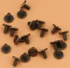 A collection of metal rivets on a plain background. Náhled obrázku produktu