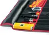 A close-up view of a rolled-up tool bag with various tools inside. Produktbild-Vorschau