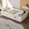 A child's bed with bedding and a pillow in a bedroom setting. Anteprima dell’immagine prodotto