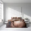 A bedroom scene with a bed featuring a duvet cover and pillowcases with a horse print. Produktbild-Vorschau