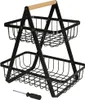 A two-tiered black metal fruit basket with a wooden handle, shown on a white background. A screwdriver is also visible in the foreground. Anteprima dell’immagine prodotto