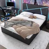 A bedroom with a gaming setup and a bed. Produktbild-Vorschau