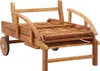 A wooden sun lounger folded for storage, shown from a side-angle. Náhľad obrázku produktu