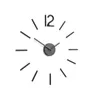 A modern wall clock with a minimalist design, featuring a central clock mechanism and individual hour markers that can be applied to the wall. Produktbild-Vorschau