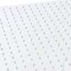 A close-up, angled view of a white showerhead with a pattern of raised bumps. Podgląd zdjęcia produktu