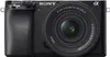 A close-up front view of a black Sony Alpha mirrorless camera with a lens attached. Produktbild-Vorschau