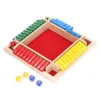 A wooden board game with colored pieces and dice on a white background. Náhled obrázku produktu