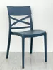 A single dark blue chair is shown against a white wall and light gray floor. Voir les images du produit