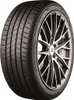 A close-up studio shot of a Bridgestone Turanza T005 tire mounted on a black and silver alloy wheel. Produktbild-Vorschau