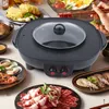 A table setting with a hot pot and grill, featuring various ingredients like raw meat, seafood, and noodles, suggesting a meal preparation scene. Voir les images du produit