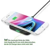 A smartphone is placed on a wireless charging pad, with a charging cable connected to the pad. Produktbild-Vorschau