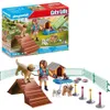 A Playmobil City Life dog trainer playset is shown, both in its packaging and assembled. Produktbild-Vorschau