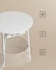 A modern side table with integrated power outlets and USB ports, featuring a woven basket underneath for storage. Produktbild-Vorschau