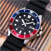 Close-up of a Casio dive watch with a black dial, silver case, and a red and blue bezel. Produktbild-Vorschau