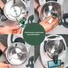 A collage of four images showing how to remove and insert the mixing knife of a Thermomix kitchen appliance. Produktbild-Vorschau