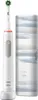 A white electric toothbrush with a green brush head and a travel case with a blue and white striped pattern. Produktbild-Vorschau
