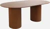 An oval dining table with two cylindrical, fluted bases. Produktbild-Vorschau